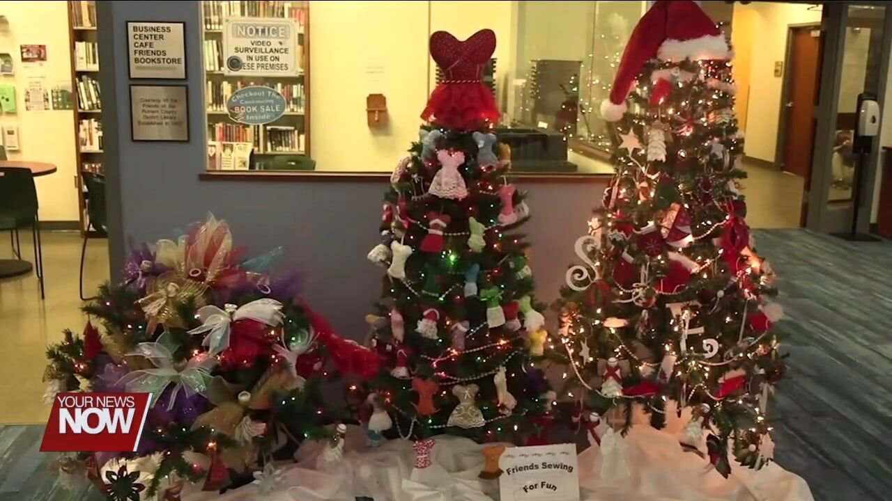 Santa visits the 33rd Christmas Tree Festival at the Putnam County District Library